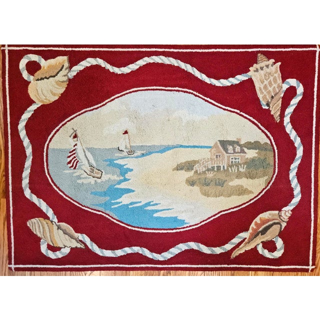 Claire Murray Design Hooked Wool Rug, Coastal Scene with Sailboats and Seashells Late 20th century This hooked wool rug...