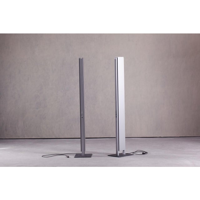 This modern artemide atreo floor lamp was designed by j. Van llerde in italy during the 2000's. Its minimalist monolithic...