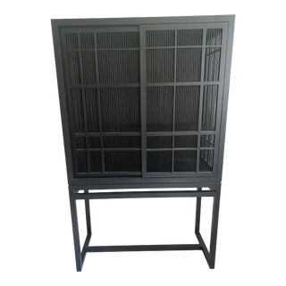 Ethnicraft Black Sliding Door Bookcase For Sale