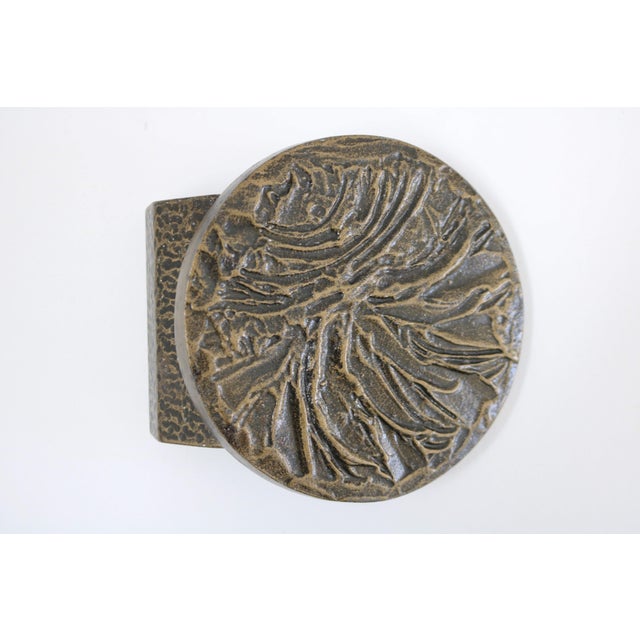 Brutalist front door handle Bronze-colored cast aluminum New and unused Old stock No pre-drilled holes are present on the...