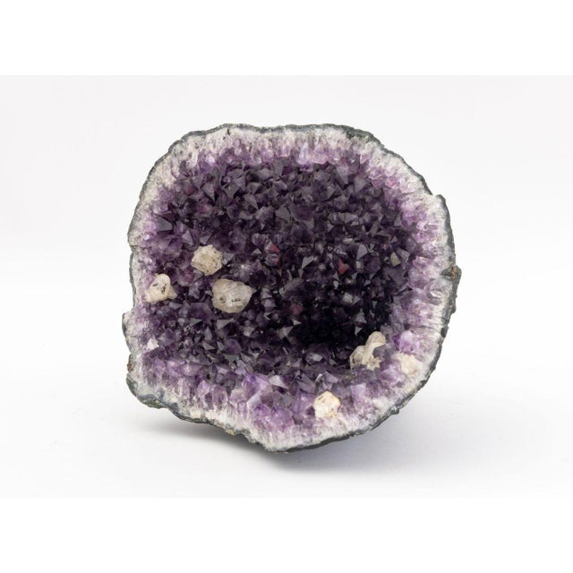 Amethyst Rock Crystal Cathedral Geode, with tourmalinated quartz inclusions. 10" H x 12.5" W x 13" D. Provenance: From a...