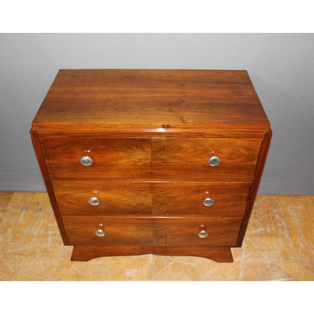 Small Art Deco period chest of drawers in walnut, it opens with three drawers, french polish finish, circa 1930, all in...