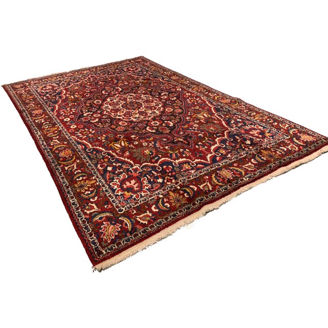 The Baktiari area (Chahar Mahal), in central Persia near Isfahan, produces both village and nomadic rugs with bright...