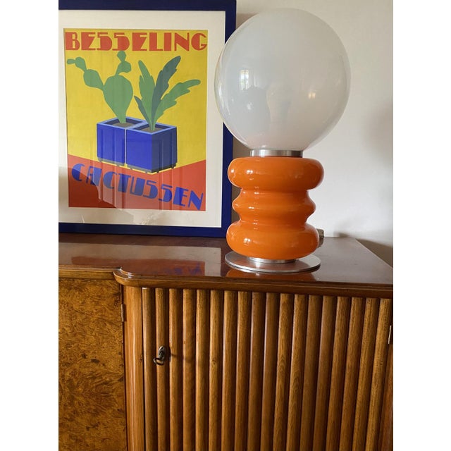 Space Age Murano glass table lamp. AV Mazzega, Italy 1970s Opaline half white glass and orange glass. Chromed aluminum....