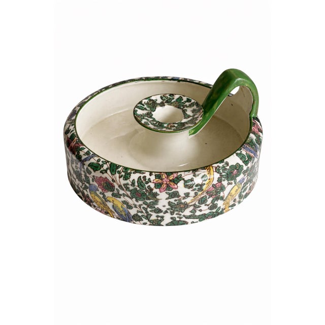 A beautifully detailed vintage Royal Doulton “Persian” chintz candle holder, featuring an intricate botanical and bird...