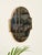 Wonderful and unique small shield-shaped mirror with a solid brass frame. This elegant piece was produced in Italy during...