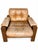 A substantial pair of characterful armchairs in the brutalist style by asko, featuring a solid oak frame and original,...
