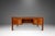 This iconic Danish modern "floating" executive desk, produced by the lauded Dyrulud in the late 60's - early 70's,...