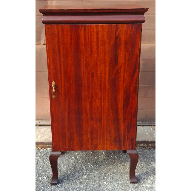 A Victorian Refurbished Mahogany Sheet Music Cabinet, Circa 1900s Measures 19.75" in width, 15" in depth and 37.5" in...