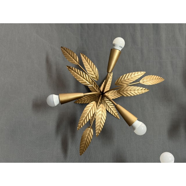 3 x ceiling lamps floral motifs in iron made in spain, circa 1950 height: 20 cm largest diameter: 45 cm smallest diameter:...