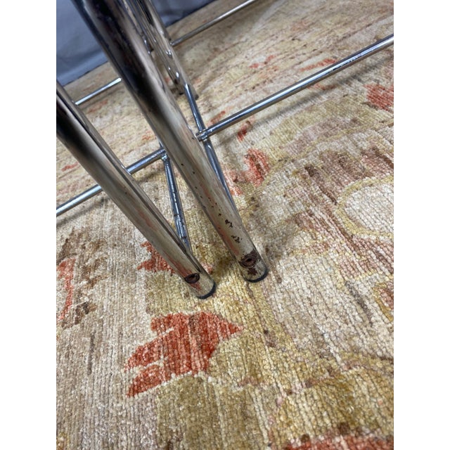 Discover these iconic mid-century Italian stools, made of tubular chrome and wrapped with clear PVC strands. These are...