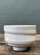Vintage Ceramic Studio Pottery Bowl with a balanced, tactile form defined by subtle concentric ridges and a smooth, soft...