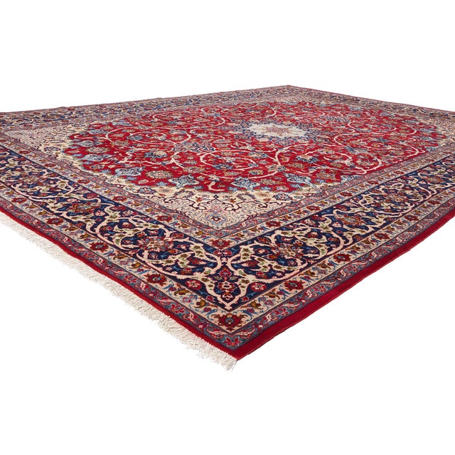 78981 Vintage Red Persian Isfahan Rug, 10'11 x 15'01. This stunning hand-knotted wool vintage Persian Isfahan rug embodies...