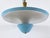 Extremely rare, large and highly decorative mid-century modern four-flamed ceiling lamp or pendant light. Designed and...