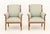 Pair of Swedish Mahogany Bergeres, 19th century, with light blue upholstery with feather motif, gilt metal accents and...