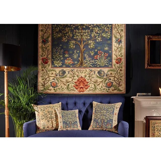 This tapestry is also known as The Garden and is from an embroidered wool portiere designed by John Henry Dearle...