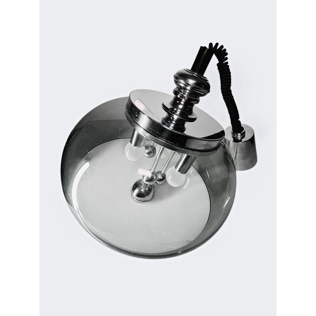 Space Age Acrylic Glass and Chrome Sputnik Ceiling Lamp, 1970s, in Good conditions. Designed 1970 to 1979 Up to 250V...