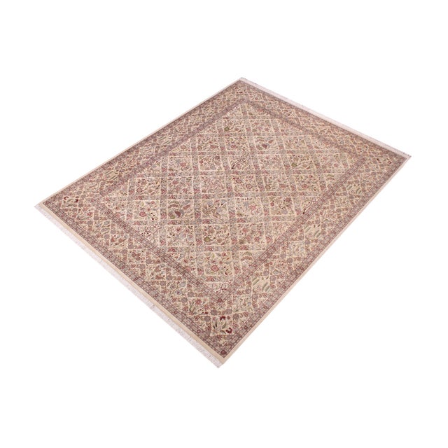 Designed with mesmerizing intricacy and gorgeous color palette, this hand-knotted masterpiece demonstrates the beauty and...