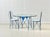 An exceptional and collectible dining set from Cassina's early I Maestri collection, based on designs by Frank Lloyd...