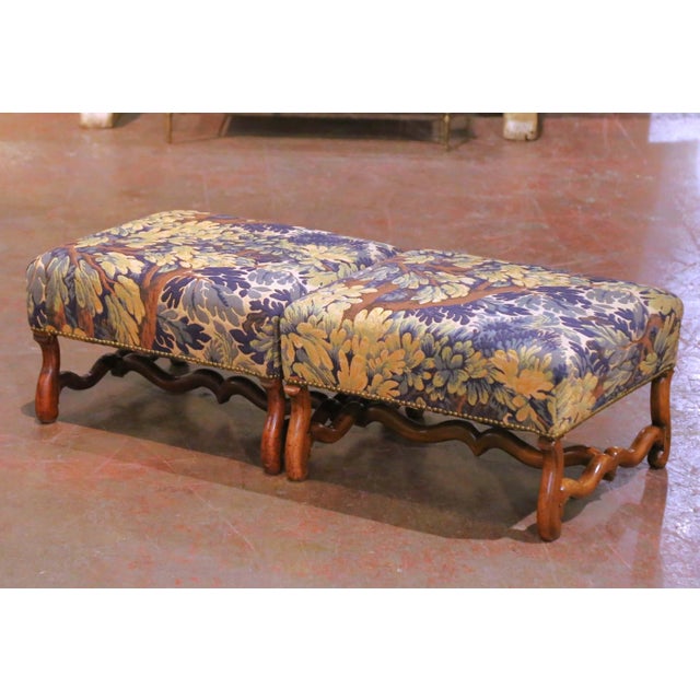 A handsome pair of antique French stools crafted in solid walnut circa 1880, reflecting the robust and sculptural...