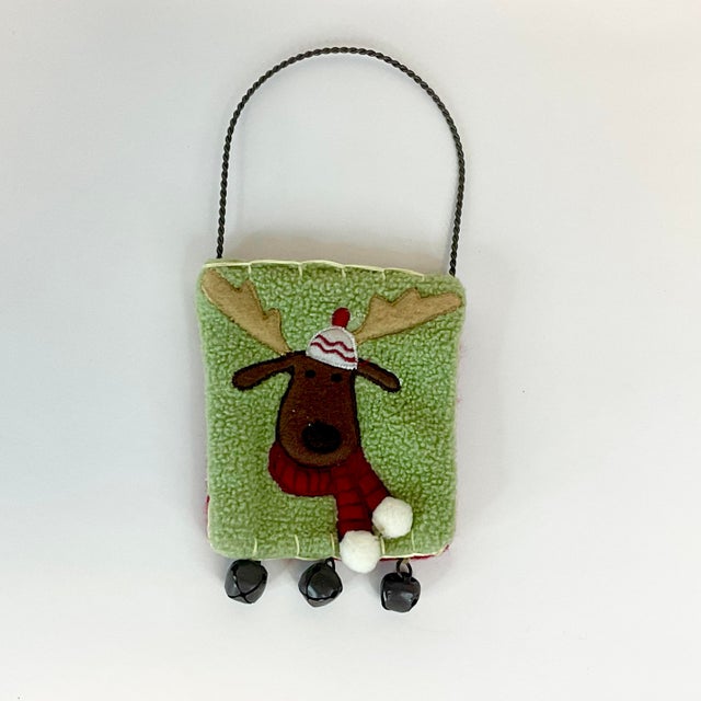 This little guy is whimsical and adorable. We have here an Arts & Crafts Boho Chic Reindeer Door Hanger. It features a...