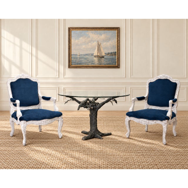An elegant pair of beautifully crafted "Indian Cove Lodge" lounge armchairs, made in Italy and designed by Ralph Lauren....