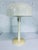Mid-Century Modern Desk or Table lamp made of plastic with removable shade; designed by Gerald Thurston for Lightolier.