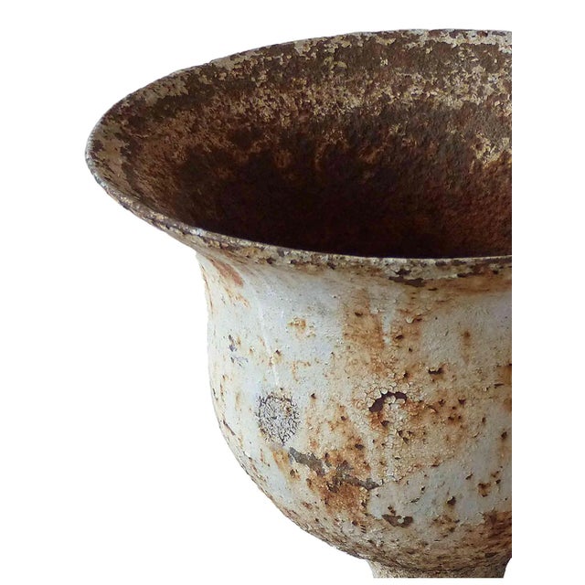 Early 20th Century traditional cast iron garden urn from an early Hudson River house in upstate New York. The surface is...