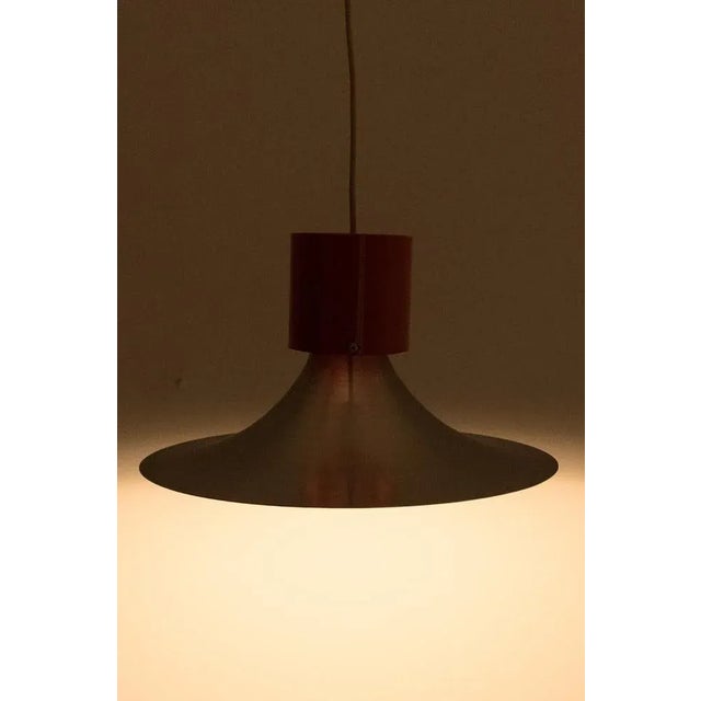 A funky metal pendant lamp with an organ holder. Has some small traces of use. In normal vintage condition. Measurements...