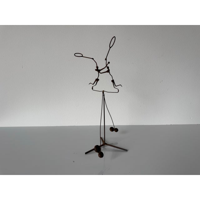 This captivating vintage kinetic sculpture embodies the raw, textural aesthetic of Brutalist art, crafted entirely from...