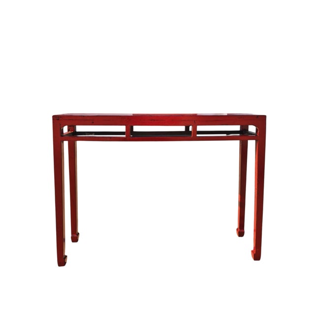 This antique 19th-century console table is a traditional open-frame accent piece made from solid elm wood from the Shanxi...
