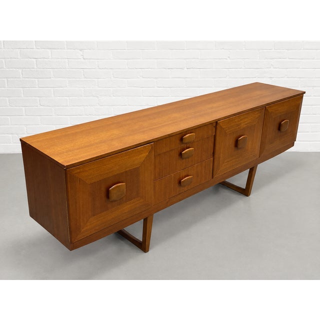 Brown Mid Century Modern Teak Credenza by Stonehill | Long Sideboard With Funky Sculpted Pulls and Sled Legs, Made in England, C. 1960’s For Sale - Image 8 of 18
