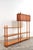 Room divider This 1950s shelving unit features a combination of oak and beech wood, along with a mahogany cabinet section...
