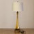 This beautiful mid-century vintage handblown glass table lamp features a tall, sculptural silhouette with amber, honey,...