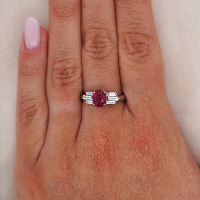 GIA-certified natural 2.00 carat vivid red Burma ruby with a trade-described “Pigeon's Blood” color appearance is set in...