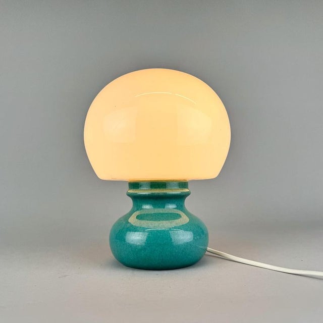 Vintage table lamp made of opal glass shade and glazed ceramic base. Manufactured in former Czechoslovakia in the 1960's....