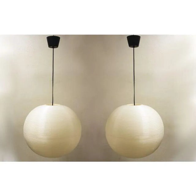 This pendant light with a minimalist design by Yasha Heifetz is designed in Rotaflex, a process allowing an object to be...