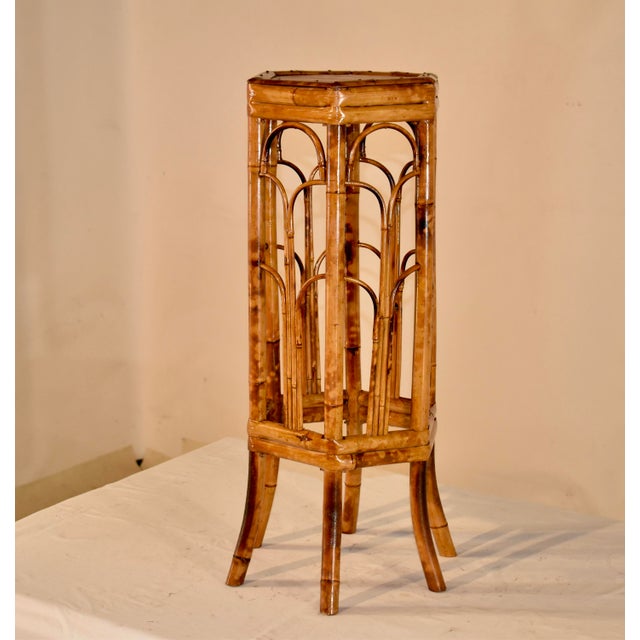 Lovely tortoise bamboo plant stand from France, circa 1960's. This is a gorgeous piece with elegant and simple lines to...