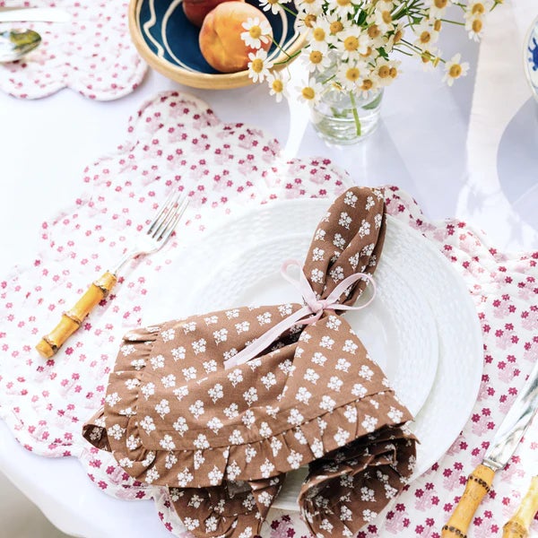 DESCRIPTION A set of four cotton napkins featuring our brown and white Constance floral print. The napkin edges are...