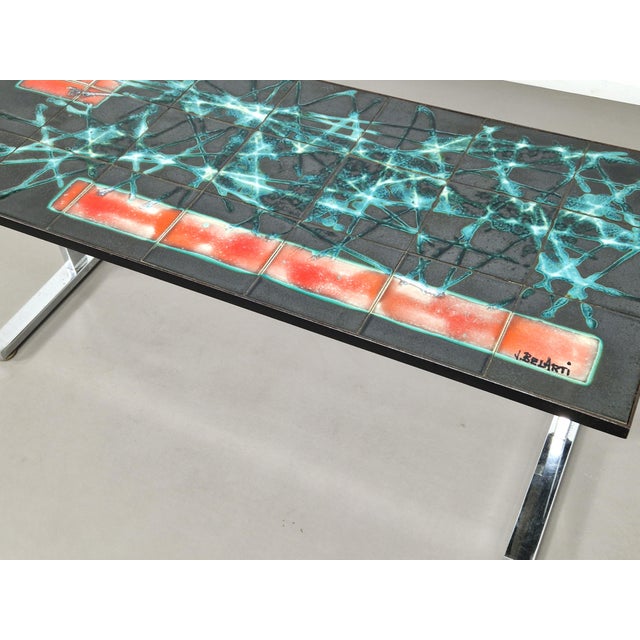 If you need some color in your home, this might be the table for you. Great example of a ceramic tile art coffee table by...