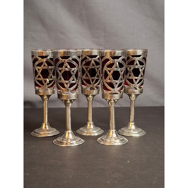 Up for your consideration is an exceptional, vintage set of five (5) sterling silver and glass Judaica cordial / Kiddush...