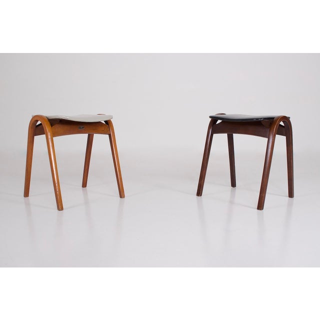 Pair of stools by modernist designer Isamu Kenmochi (1912-1971) for Akita Mokko, Japan, original 1960s edition. Hot-bent...