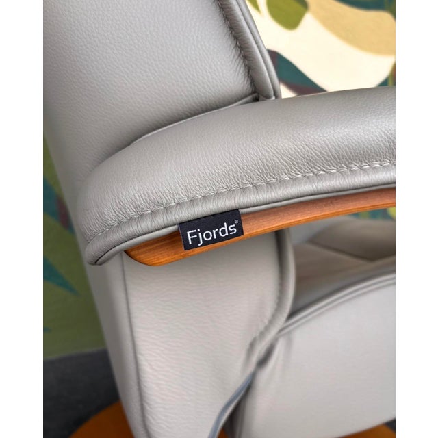 A luxe, extremely comfortable pair of Fjords recliners with ottomans. They swivel and recline with ease and are sure to be...