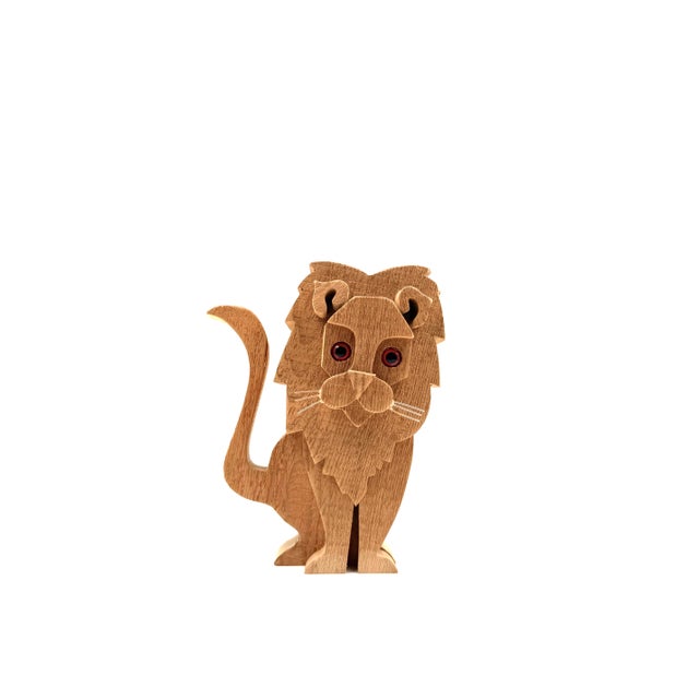 Lion wood sculpture Bottega Michelangeli, Orvieto Italy 1970s composed of assembled wooden sections H cm 26 × 22 × 12,5...