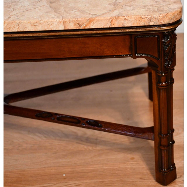 We are Pleased to offer this beautiful 1940s English Chippendale Mahogany This table is made of mahogany , featuring a...