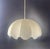 A beautiful and rare cocoon pendant light produced by goldkant leuchten, based on an iconic design by friedel wauer. this...