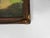 Antique early 20th century giltwood picture frame with batwing or pie crust corners. Comes with a period tinted photograph...