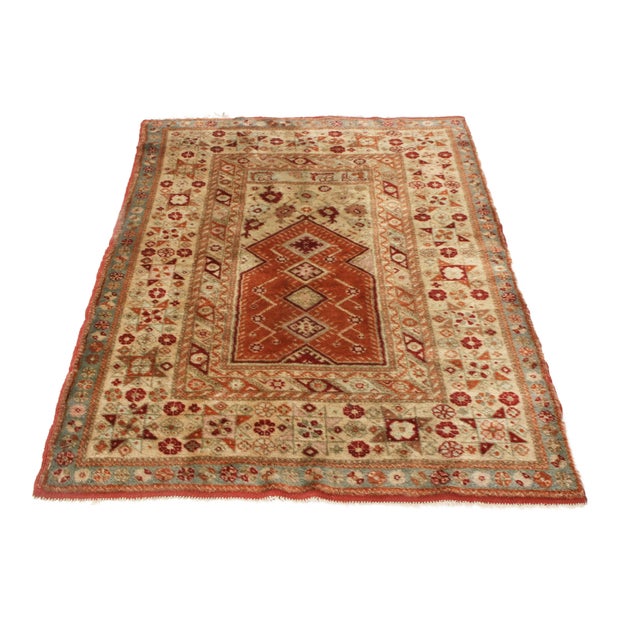 Originating from Europe in 1910, this antique traditional Oushak rug employs a seldom-seen abundance of various oriental...