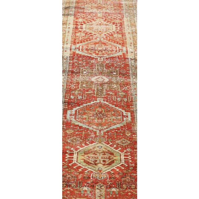 Measures: 2'8 x 10'6 Antique Persian Heriz Distressed Runner with Geometric Medallions in Soft Colors. Keivan Woven Arts /...