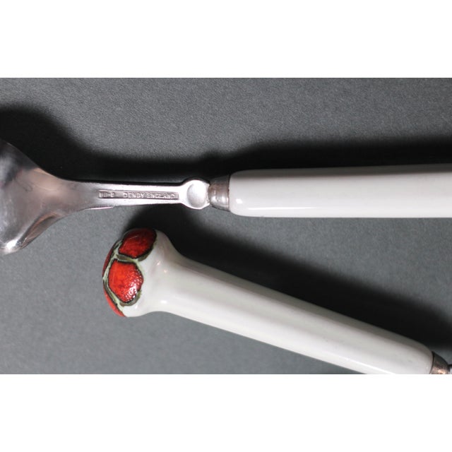 Individually priced. Wonderful design of flatware with a ceramic handle in white, orange red, and brown. Mushroomed at the...